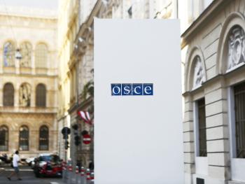 The OSCE logo at the Secretariat entrance.