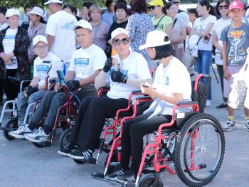 Participants of the “PwD Walkathon”, organized by the OSCE Programme Office in Bishkek, Issyk-Kul, Kyrgyzstan, August 2022.